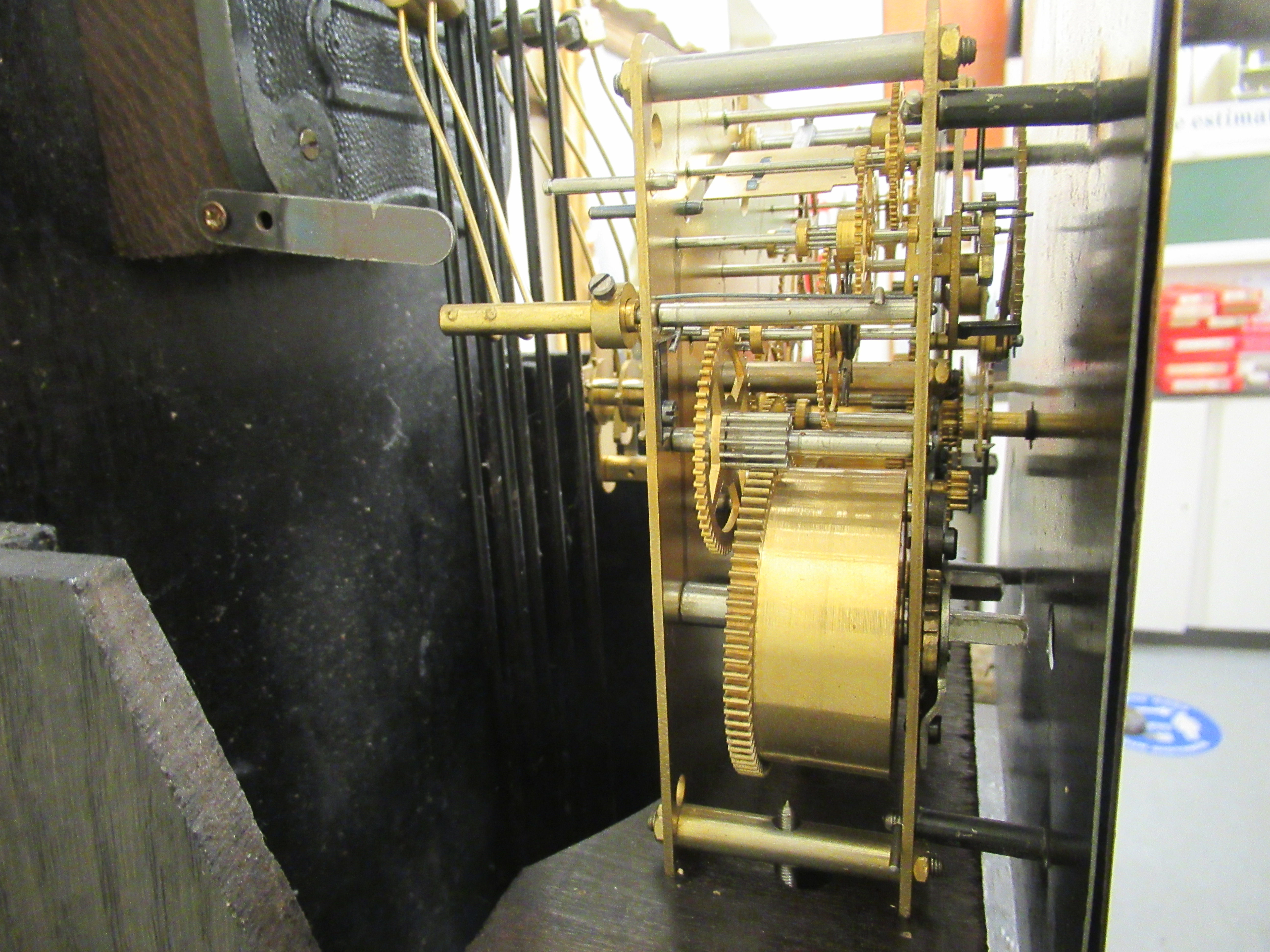 A 1920s/1930s oak cased granddaughter clock, the chiming movement faced by a Tempus Fugit Roman - Image 5 of 5