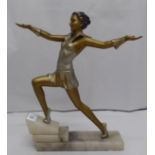 An Art Deco inspired bronze effect figure, a dancer, on a marble plinth  11"h