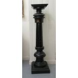 An early/mid 19thC and later ebonised torchere, the square top over a turned C-scrolled, engraved