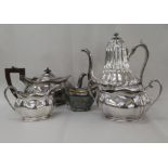 A Victorian style three piece silver plated tea set; and another dissimilar teapot and cream jug