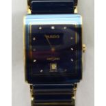 A Rado DiaStar blue enamelled and gilded stainless steel cased bracelet wristwatch, faced by a