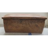 A 20thC rustically constructed teak dug-out chest with a side sliding lid, over straight sides  16"h