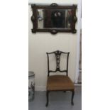 An Edwardian mahogany framed bedroom chair; and a 1920s oak framed mirror  32"h  21"w