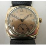 A mid 20thC Mido rolled gold cased wristwatch, faced by an Arabic dial with subsidiary seconds