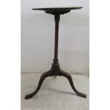 An early 19thC mahogany tip-top pedestal table, raised on a splayed tripod base  27"h  14"w