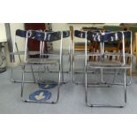 A set of six 1980s black plastic and tubular steel framed folding chairs