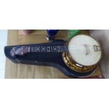 A Sunray hardwood and gilt metal ukulele  cased
