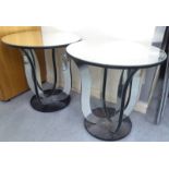 A pair of modern mirrored glass side tables, raised on scrolled legs  22"h  22"dia