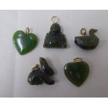 Five jade coloured pendants