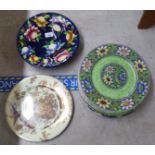 Ten Maling china plates, decorated in unique designs  11"dia; and a shallow bowl  11"dia