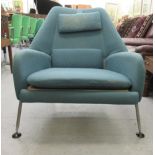 A 1960s Ernest Race Heron, bucket style, high back, enclosed armchair, upholstered in cushioned