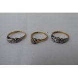 Three 18ct gold variously set diamond rings