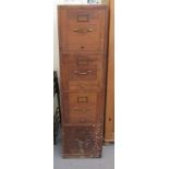 A mid 20thC panelled oak, four drawer filing cabinet with cast brass handles  53"h  15"w (for 12"