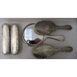 A five piece silver backed dressing table set with engine turned decoration  Birmingham 1910