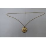 A 9ct gold fine belcher link chain; and a yellow metal pendant locket