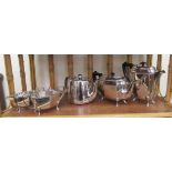 A four piece silver plated tea set  comprising a teapot, coffee pot, sugar basin and cream jug;
