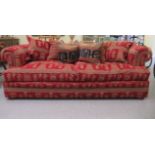 A modern red and beige tapestry upholstered four person Chesterfield style settee