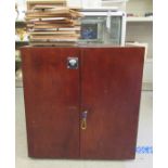 A modern mahogany finished coin collectors cabinet with ninety-eight fitted drawers and approx