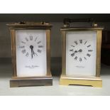 Two 20thC lacquered brass and bevel glazed cased carriage timepieces, on bracket feet; one by
