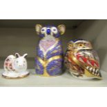Three Royal Crown Derby bone china paperweights, viz. an owl  3"h; a koala  4.5"h; and a pig  2"h