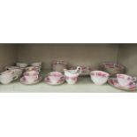A Grosvenor China twelve person tea set  comprising cups, saucers, plates and serving dishes