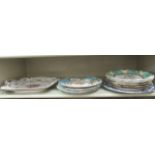 Decorative plates: to include a set of three mid 19thC Coalport china plates, decorated with