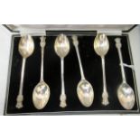 A set of six Sterling silver teaspoons, each with three standing lions on the terminal