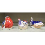 Three Royal Crown Derby bone china paperweights, viz. a robin  2.75"h; and two wrens  2.5"h