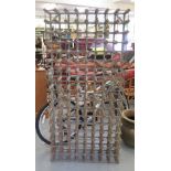 A modern galvanised metal and pine framed wine rack, accommodating 144 bottles  65"h  31"w
