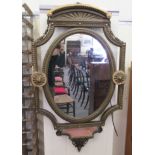 A late Victorian mirror, in an ornate gilt gesso frame, incorporating a shelf  41" x 27"