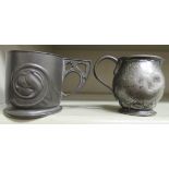 An early 20thC Tudric pewter mug with cast ornament and an angular handle  impressed 0358