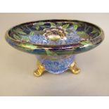 A Maling china sponged and gilded lustre glazed bowl with a flared, inverted rim, decorated with