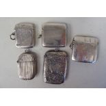 Five dissimilar late 19th/20thC silver vesta cases with strike plates  mixed marks