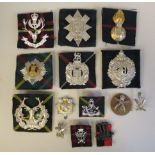 Six various Gurkha military badges; and seven Scottish Regimental cap badges, some copies (Please