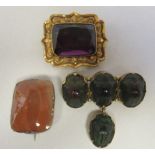 Vintage items of personal ornament, viz. a yellow metal and scarab beetle pendant brooch; a scroll
