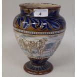 A Doulton Lambeth stoneware pedestal vase, decorated with a pride of lions and green and brown