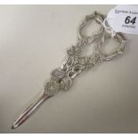 A pair of late Victorian silver grape scissors with cast fruiting vine ornament  Hilliard & Thomason