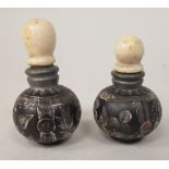 A pair of 19thC Asian snuff bottles of bulbous form with turned ivory stoppers  3"h