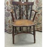 A mid/late 19thC Thames Valley region yew, beech and elm framed Windsor elbow chair with a level,