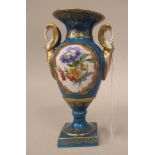 A Limoges porcelain ovoid shaped, twin handled, pedestal vase, decorated in reserves with floral