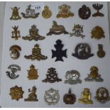 Twenty-seven military cap badges, some copies: to include The Lancaster Fusiliers, North Stafford