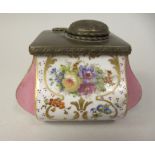 A late 19th/early 20thC Continental porcelain inkwell of square form with a bronze effect mount