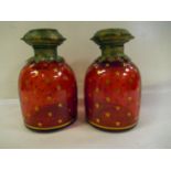 A pair of late 19thC Continental gilded cranberry coloured glass, inverted bell design dressing