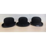 Two Lock & Co bowler hats; and an example by Gieves of Old Bond Street  various sizes
