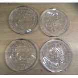 A set of four Pukeberg (Sweden) glass plates, decorated with seafood  10"dia