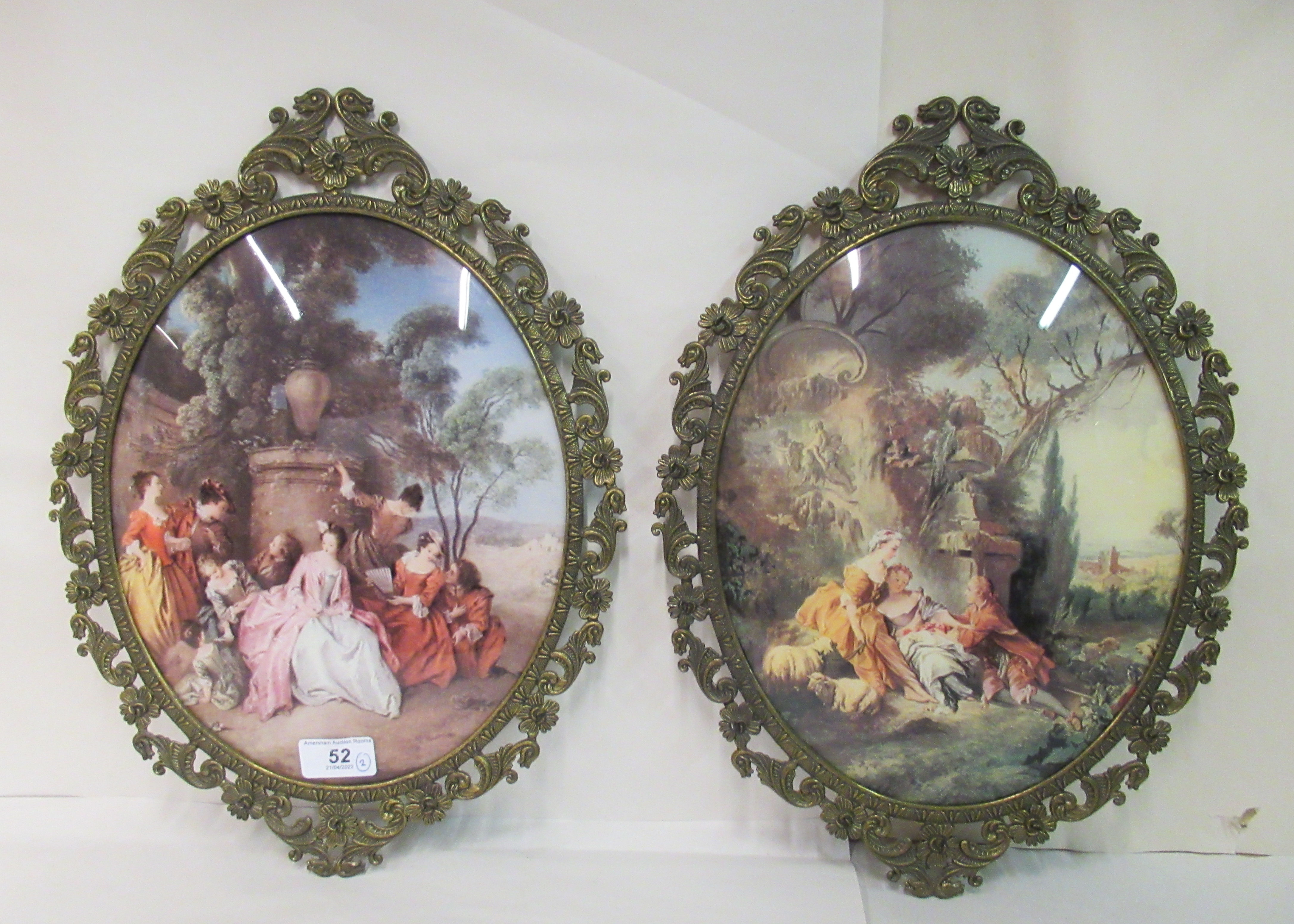 Two modern cast metal Victorian style frames  12" x 9" each with a reproduced 19thC oval print