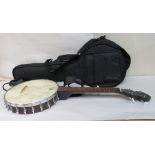 A Savannah five string banjo, in a fitted, soft black fabric carrying case