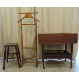 Small furniture: to include an Edwardian mahogany drop leaf tea trolley table, raised on block legs,