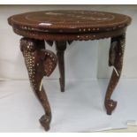 A modern Indian bone inlaid fruitwood occasional table, raised on carved elephant legs  20"h  20"dia