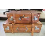 Two modern tan coloured stitched hide suitcases with stainless steel fittings  largest 7" x 24"